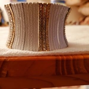 White thick bracelet with rows of gold & crystals